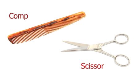 Metal scissor and comp isolated on white background for barber shopの写真素材