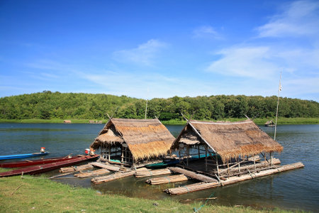 Two bamboo roof rafts floating on the lake near the shore at Huai Krathing in Loei, Thailand のeditorial素材