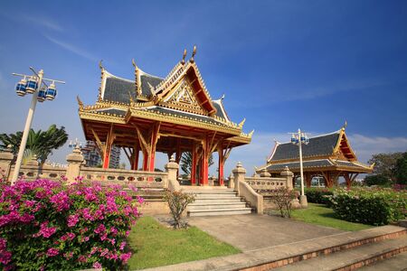 Beautiful shrines against blue sky at Chalerm Prakiat park in Nonthaburi province, Thailandの写真素材