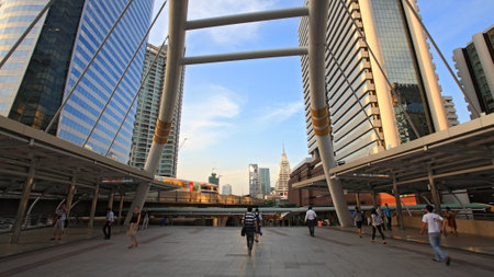 BANGKOK-DEC 20  Unidentified people walking on public sky walk for transit between Sky Transit and Bus Rapid Transit Systems at Sathorn-Narathiwas junction on December 20, 2012 in Bangkok, Thailand  のeditorial素材