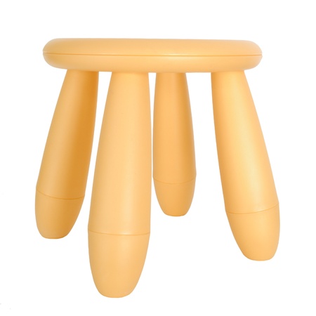 Baby cream plastic stool isolated on white backgroundの写真素材