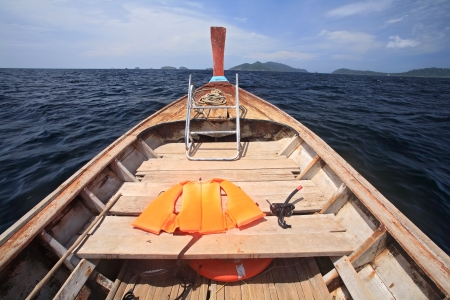 Life vest and snorkel on wooden boat for diving at Koh Lipe in Satun, Thailandの写真素材