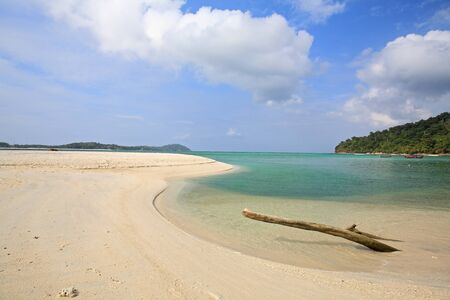 Professional photographer at Pa Chado peak on Koh Adang taking photo of Koh Lipe in Satun, Thailand の写真素材