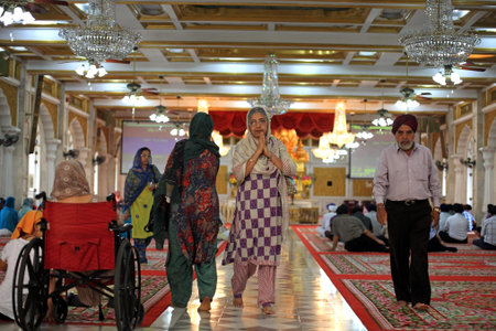 BANGKOK-MAR 16 Unidentified Sikh people pray inside Gurudwara Siri Guru Singh Sabha temple on March...