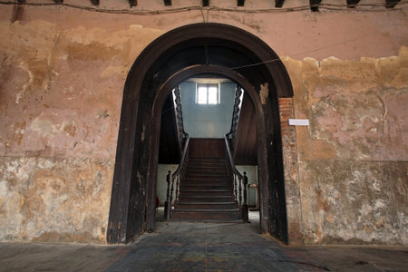 Main entrance to antique wooden stairs in old buildingの写真素材