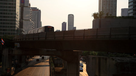 BANGKOK-MAR 16  BTS skytrain runs through Sathorn business center on March 16, 2013 in Bangkok, Thailand  Each skytrain can carry over 1,000 passengers through 32 stations around city and suburbs  のeditorial素材
