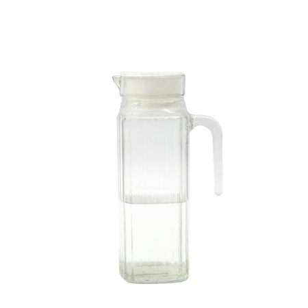 Transparent glass jug or pitcher with water isolated on white background の写真素材