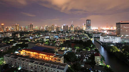 Bangkok downtown skyline near the canal at twilight by aerial view, Thailandの写真素材