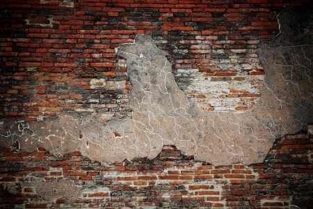 Cracked concrete and grunge brick wallの写真素材