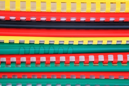Colorful plastic spine attached on booksの写真素材