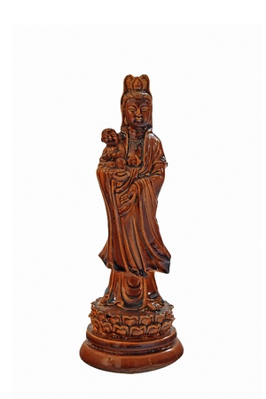 Guan Yin Buddha Statue postures of giving alms child isolated on whiteの写真素材