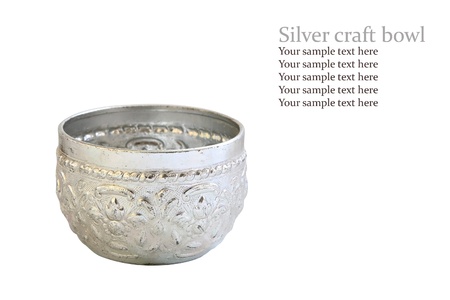 Silver bowl with Thai craft pattern isolated on whiteの写真素材