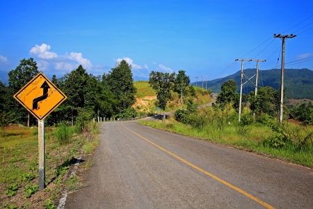 Road sign to travel destinationの写真素材