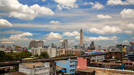 BANGKOK-JUL 13  Aerial view of BTS sky train running on elevated rail on July 13, 2013 in Bangkok, Thailand  Each train of the mass transport rail network can carry over 1,000 passengers  のeditorial素材