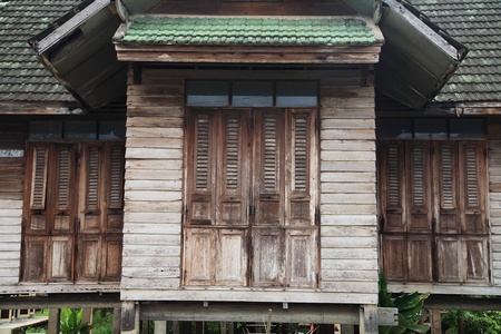 abandoned old wooden house in Thailandの写真素材