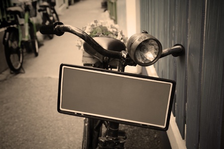 Vintage old bicycle with blank plateの写真素材