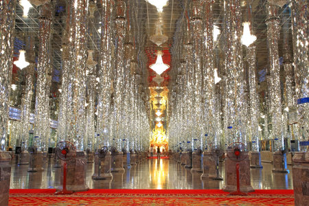 UTHAI THANI, THAILAND-MAY 14: glass pillars and golden Buddha statue at wat Tha Sung, establish since Ayutthaya era and renovated on 1968, in Uthai Thani, Thailand on May 14,2013.のeditorial素材