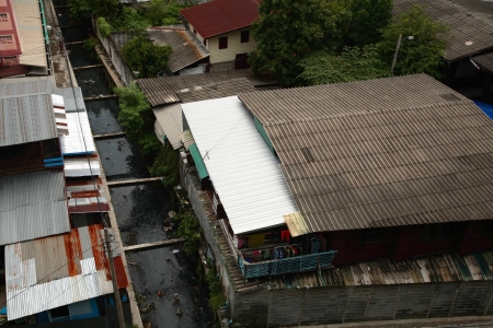 Aerial view of Slum near dirty canal in Bangkok, Thailandの写真素材