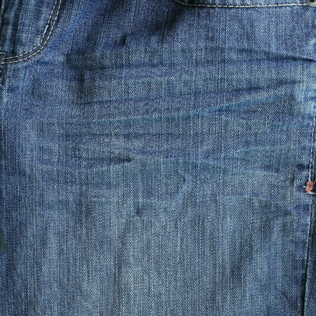 Closeup texture of pale blue jeansの写真素材