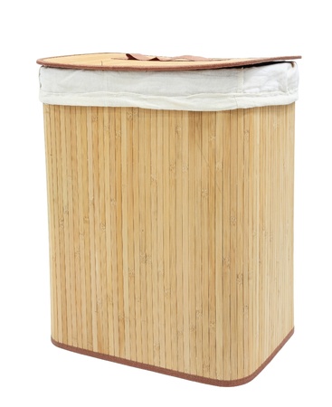 Mat wooden container covered by white textile and lid isolated on whiteの写真素材