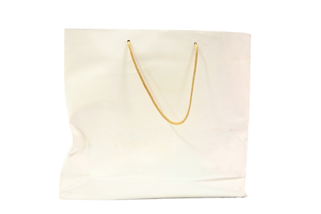White old rough shopping bag isolated on whiteの写真素材
