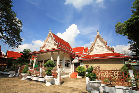 Thai temple architecture of wat Chalerm Phrakiat against blue sky in Nonthaburi, Thailandの写真素材
