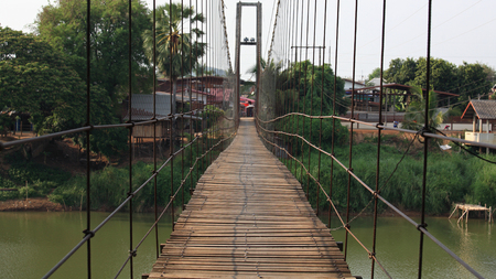 Black and White: Rope wooden bridge to village in Sukhothai, Thailandの写真素材