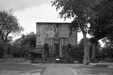 Buddha statue inside church or mondop at Wat Srichum in Sukhothai, Thailandの写真素材