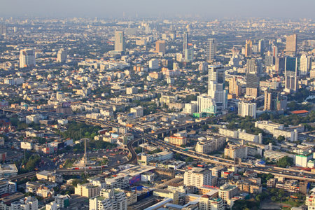 BANGKOK, THAILAND-JAN 05: Aerial cityscape view of Victory Monument and modern buildings from Baiyok Tower on January 05, 2013 in Bangkok, Thailand.のeditorial素材