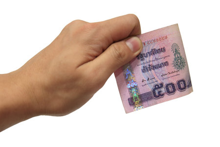 Man s hand with a banknote Isolated on white  Corruption  