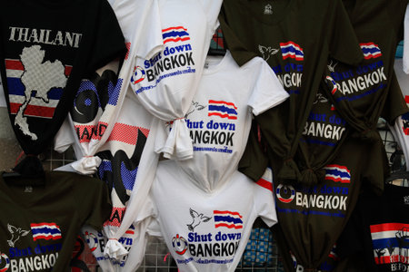 BANGKOK- Jan 24: T-shirt souvenirs of "Bangkok Shutdown" protest at Ladprao junction protest area on Jan 19, 2014 in Bangkok, Thailand.のeditorial素材