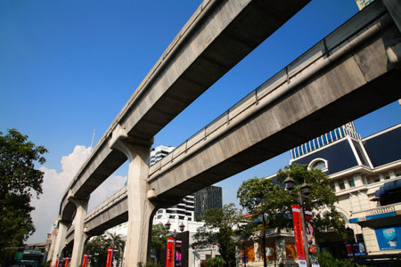 BANGKOK, THAILAND - FERBUARY 19, 2014: BTS Skytrain elevated rails at Ratchaprasong in Pathum Wan District. Elevated rails cover business, resident, and tourist areas by 32 stations.のeditorial素材