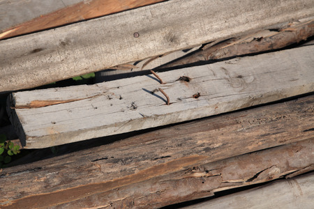 Stack of old Wood timbers for construction materialの写真素材
