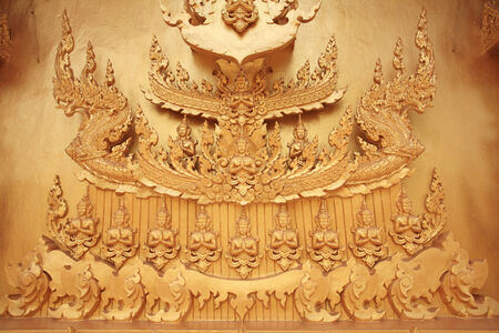 Thai heritage art sculpture of gods on golden temple at Wat Pak Nam  Joe Low  in Chachoengsao province, Thailandの写真素材