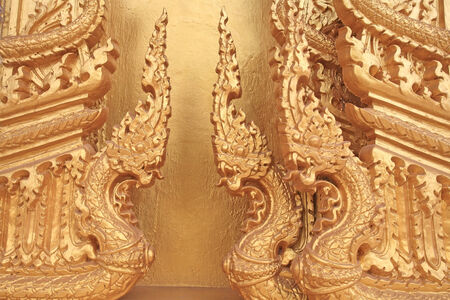 Thai heritage art sculpture of three nagas on golden temple at Wat Pak Nam  Joe Low  in Chachoengsao province, Thailandの写真素材