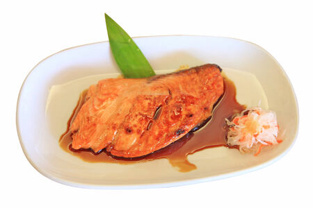 Grilled salmon with teriyaki sauce isolated on white の写真素材