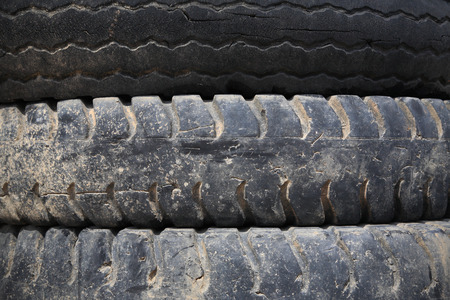 Old Truck tires stacked - background textureの写真素材