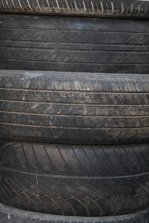 Stack of used grunge car tires' textureの写真素材