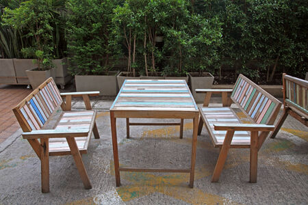 Modern table and chairs at the gardenの写真素材