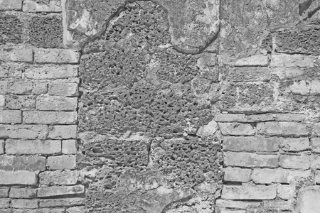 White brick wall and laterite stone textured backgroundの写真素材