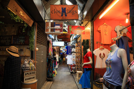 BANGKOK, THAILAND - JULY 05, 2014: Unidentified visitors shopping at many stalls in Chatuchak weekend market open from 8am - 6pm. Here is the largest weekend market in Thailand.のeditorial素材