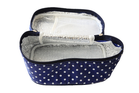 Open blue cooling bag with zipper isolated over whiteの写真素材