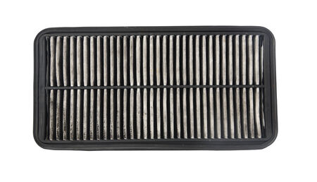 Used air filter, auto spare part isolated on white backgroundの写真素材
