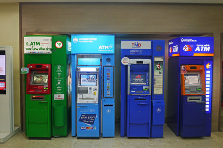 BANGKOK, THAILAND - SEPTEMBER 14, 2014:ATM units by different Thai banks, Kasikornbank, Krungthai, TMB, Bangkokbank. Most of ATMs in Thailand charge 150 bath fee for withdraw from overseas accounts.のeditorial素材