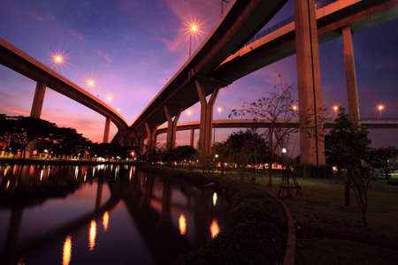 Bhumibol Bridge with skyline reflection at dusk in Bangkok, Thailandの写真素材