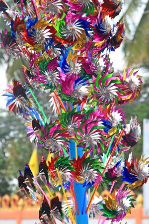 Many Colorful windmill toys for kids selling in Thai marketの写真素材