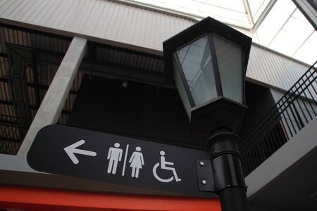 toilet index sign at the lamp postの写真素材