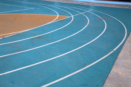 Corner curve of blue running track: Sport symbolの写真素材