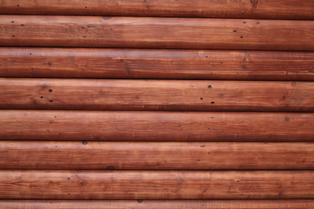 Textured background of new red wooden trunk wallの写真素材