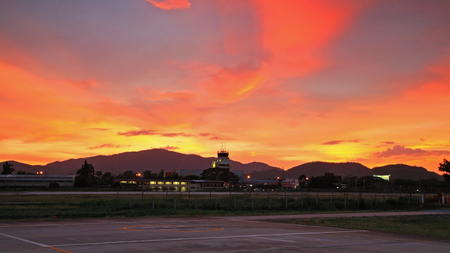Hua Hin runway, terminal, Control tower against twilight sky at dusk, Thailandの写真素材